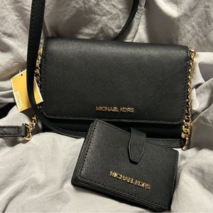Michael Kors Jet Set Travel black crossbody clutch purse
